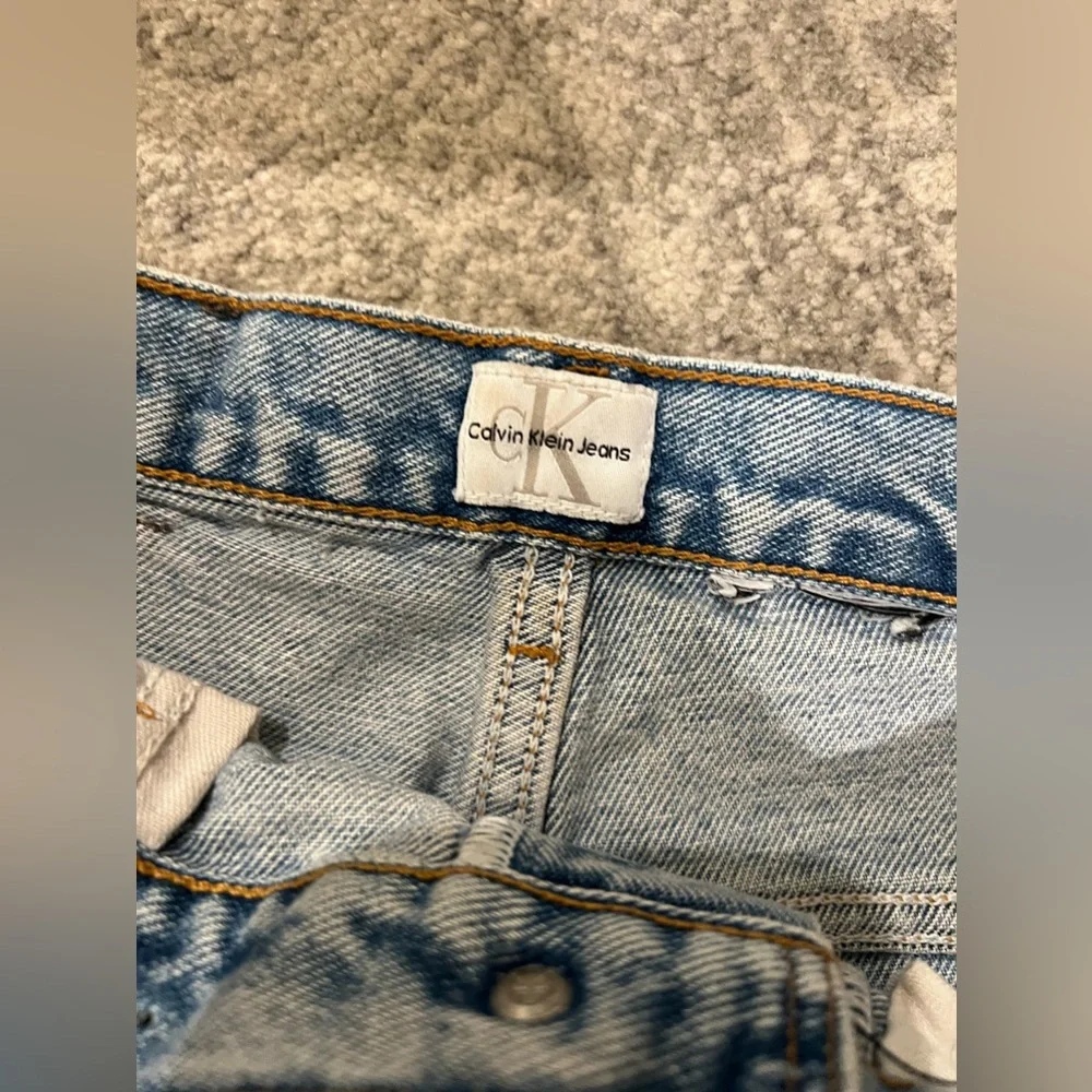Distressed denim cut off shorts